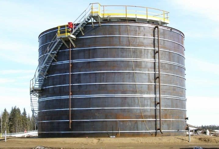 An insulated petrochemical storage tank being prepared for service