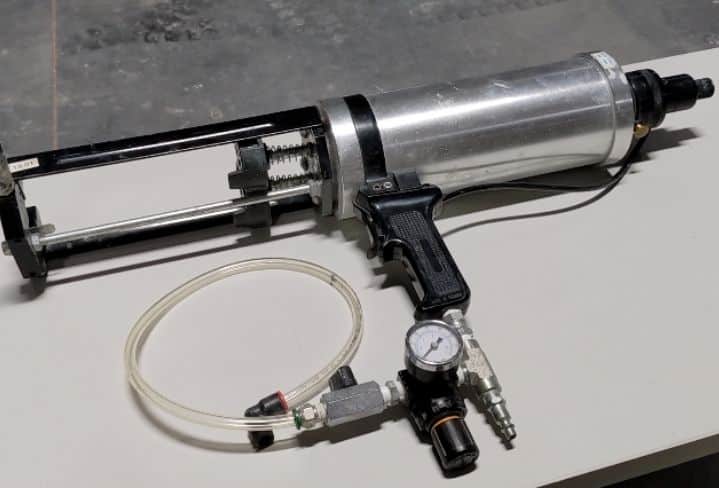 Nordson Pneumatic Dual Component Cartridge Spray Gun, ready to spray EonCoat Permanent Corrosion Protection